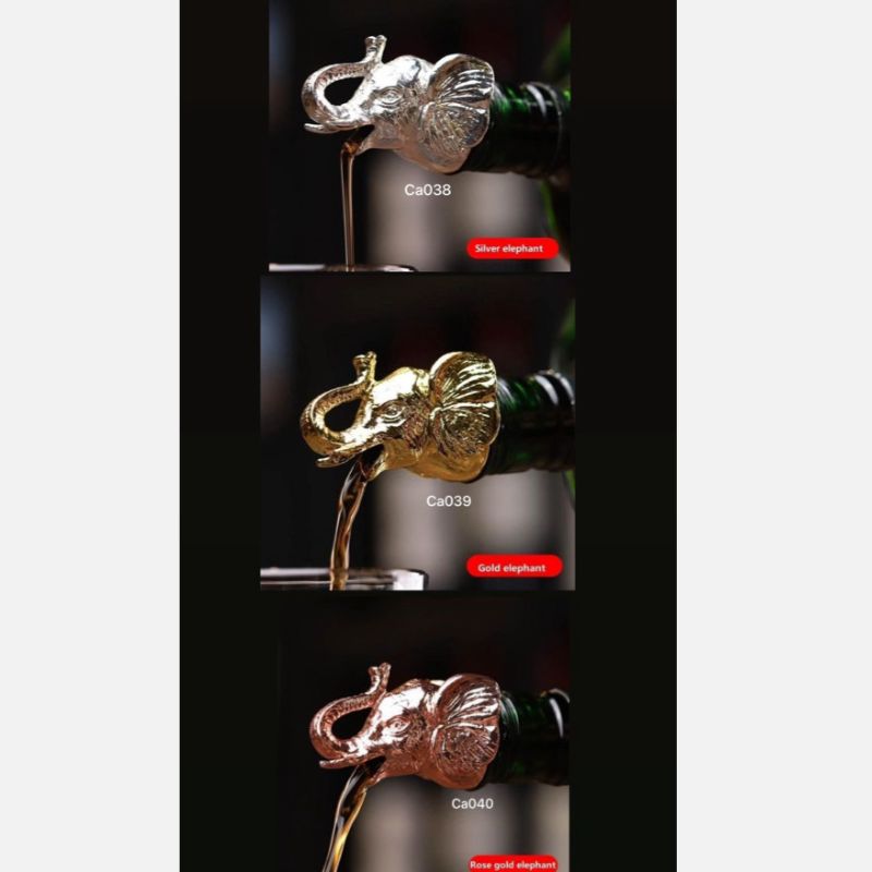 Dispensador de botellas metalico elefante dorado 10.5cm* 4cm